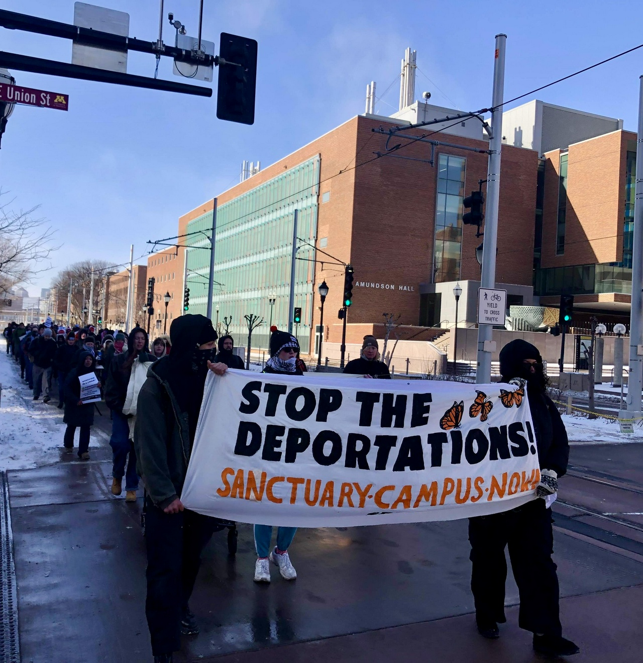 U of MN students march against deportations.