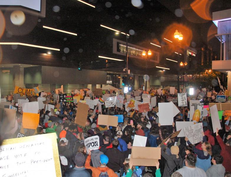 Thousands of protesters confront Trump in Minneapolis.