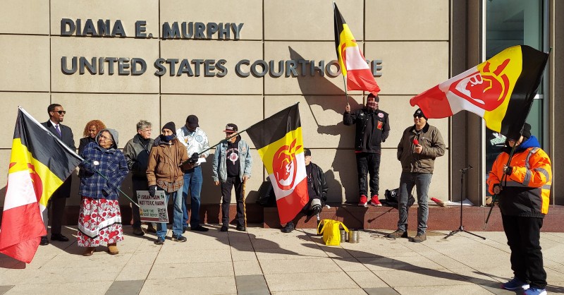 Members of AIM and Leonard Peltier Support Committee gather preparing to rally.