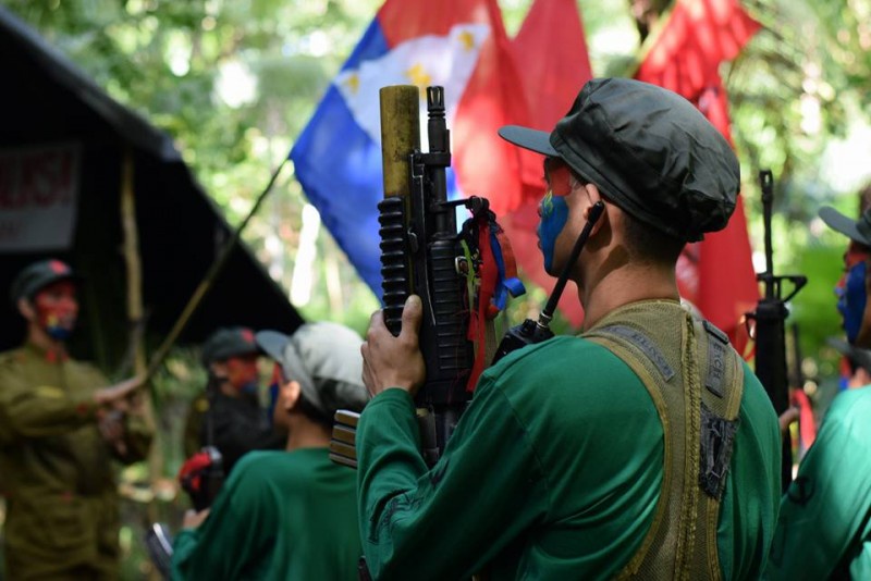 Fighters of the New People’s Army \[NPA\] defend the environment.