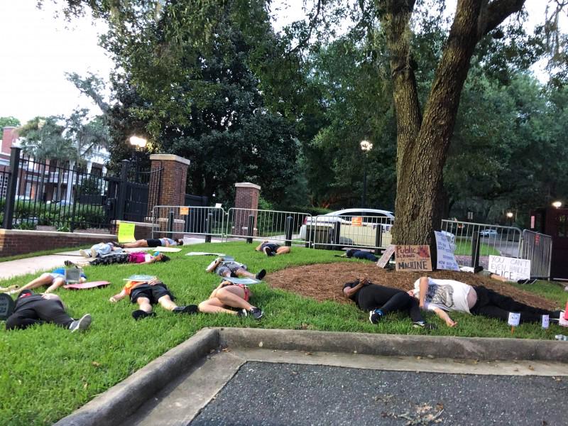 Protesters stage die-in to protest reopening of schools during covid-19 pandemic