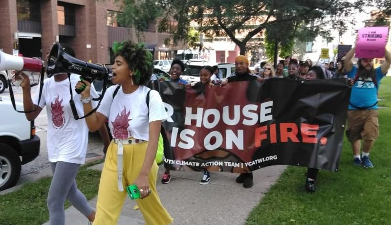 Milwaukee march challenges causes of climate change.