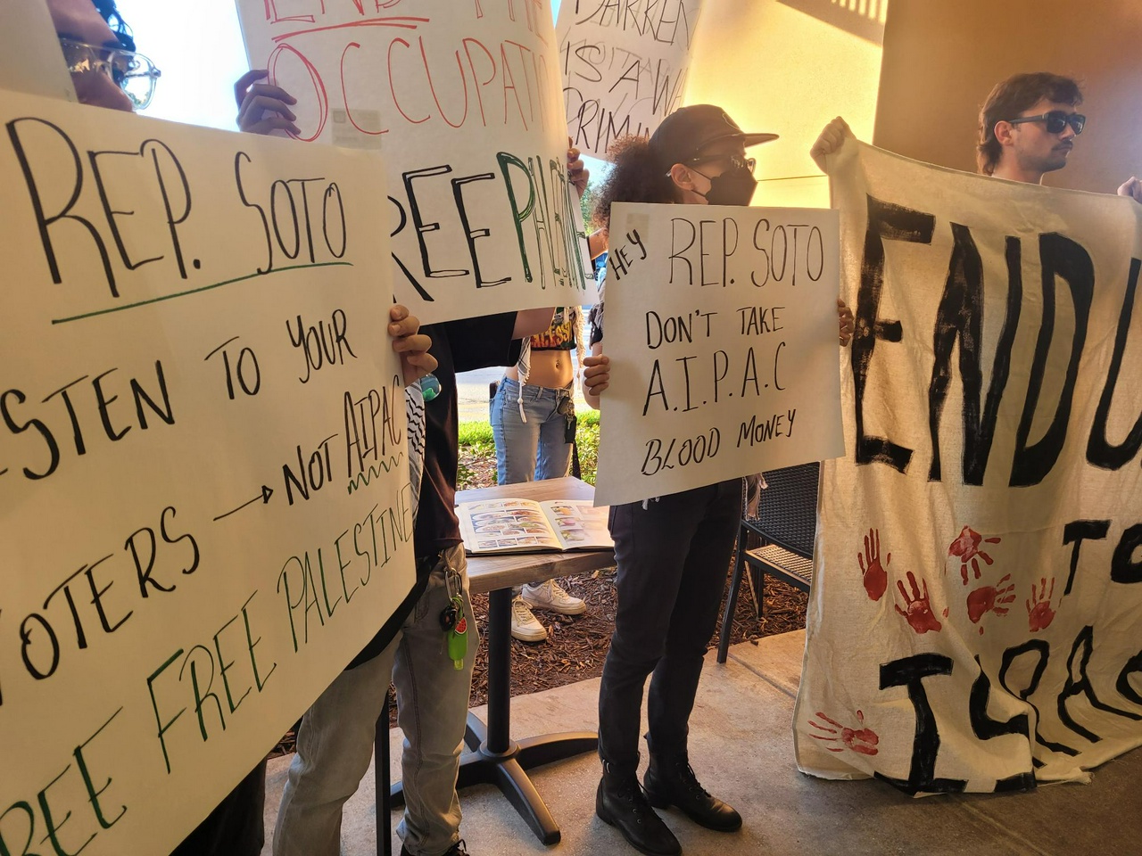 Orlando protest confronts Representative Soto for his backing of the genocide in Gaza.