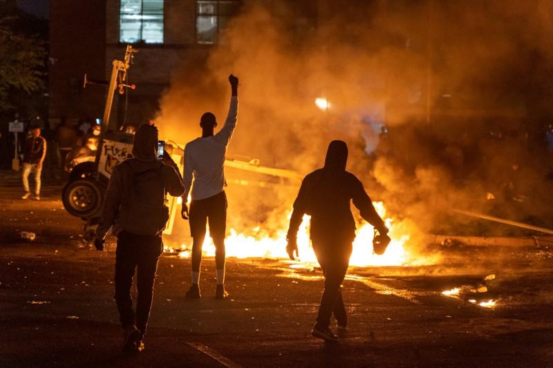 Mobile surveillance unit burning at Minneapolis's former 3rd precinct station
