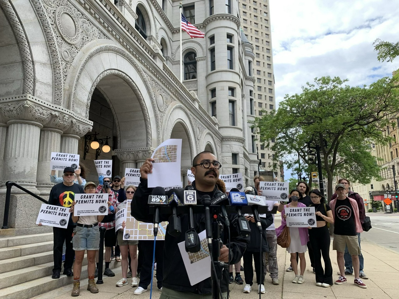 Omar Flores, co-chair of the Coalition to March on the RNC, announces a lawsuit to get march permit.  | Fight Back! News/staff