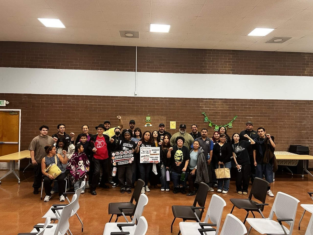 Community members at town hall meeting on misconduct of the sheriff's department. 