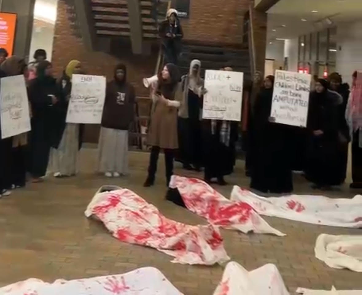 Augsburg students hold die-in to protest the murder of Palestinian children by Israel. | Fight Back! News/staff