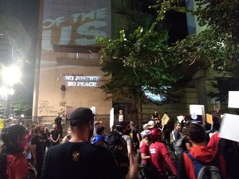 Rally at Portland federal courthouse.
