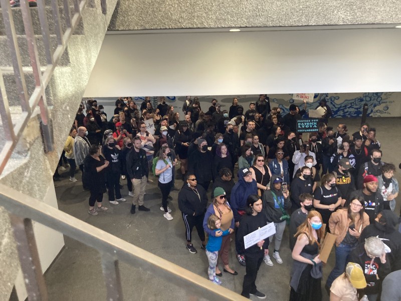 Protesters inside City Hall demand justice for Patrick Lyoya.