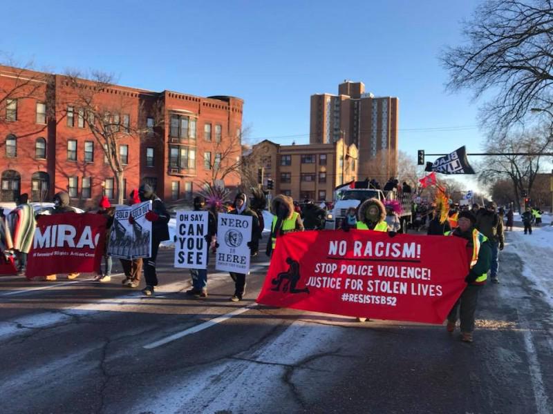 Hundreds march on the Super Bowl.