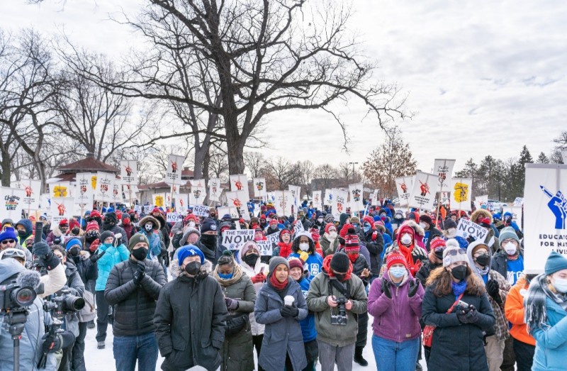 Teachers march for decent contract.