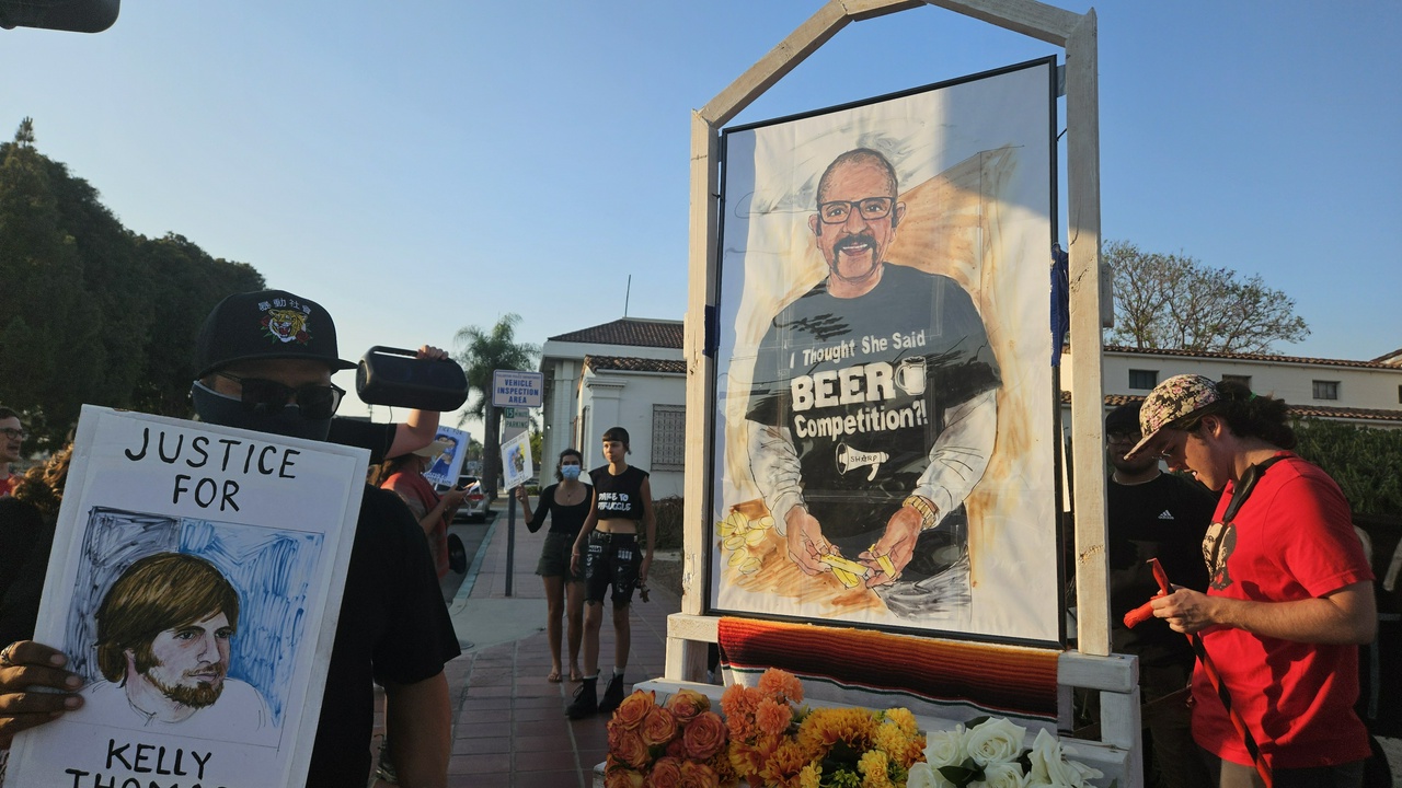Marchers protest police killings in front of Fullerton PD.