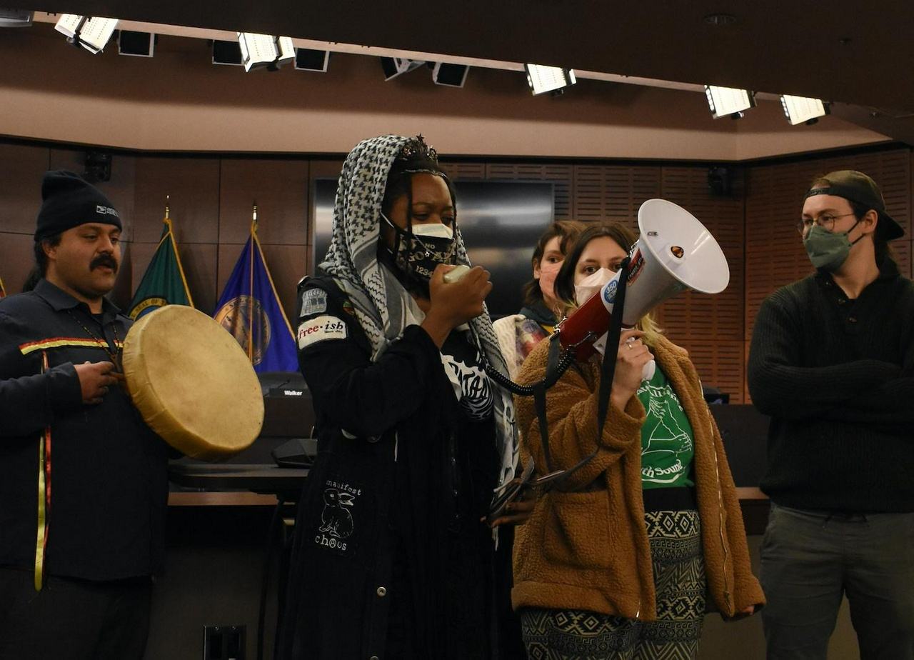 Protesters demanding a stronger climate change commision ordinance disrupt Tacoma, Washington city council meeting.  | Fight Back! News/staff