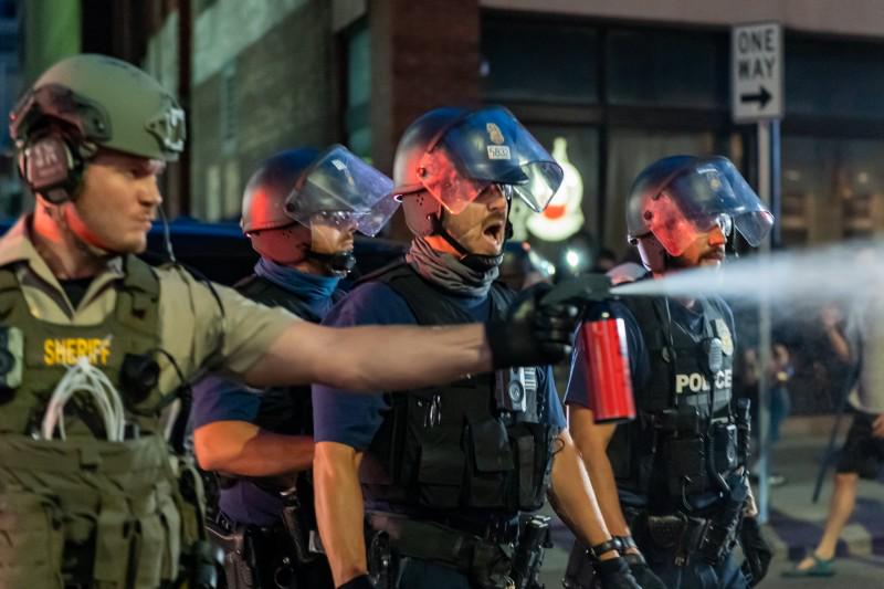 Police, sheriffs attack protesters in downtown Minneapolis.