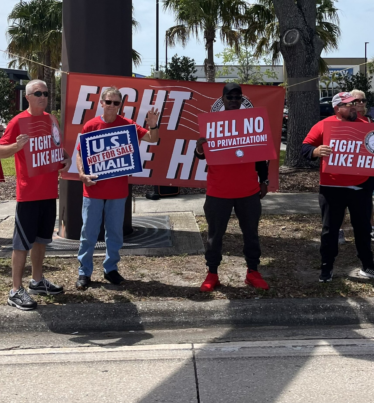 St. Petersburg, Florida postal workers rally against Trump's privatization plans.
