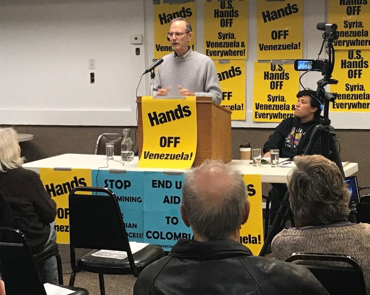Steve Ellner speaking in Minneapolis against U.S. intervention in  Venezuela.