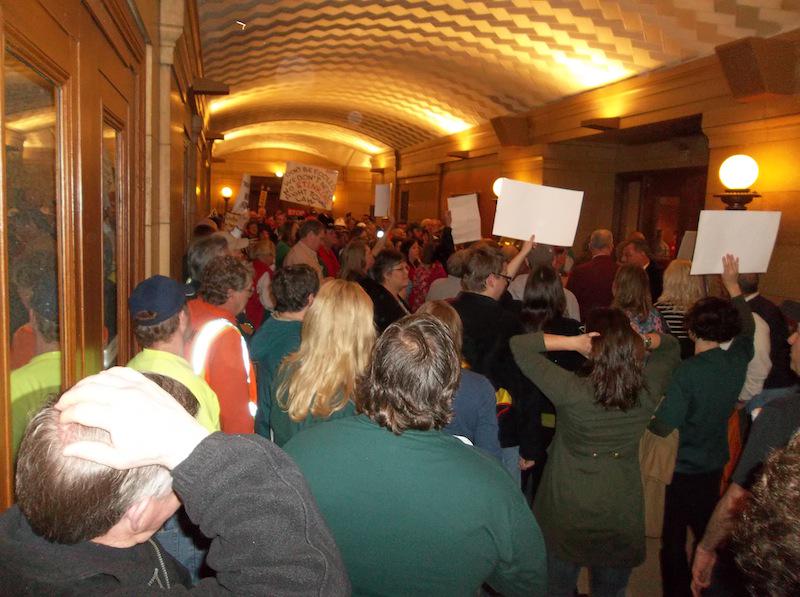 Demonstrators against "Right to Work" amendment fill halls of Mn State Capitol.