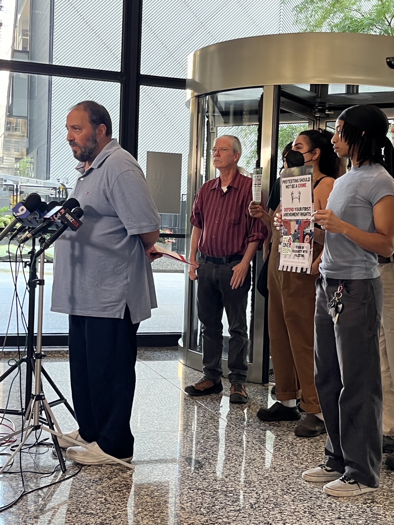 Hatem Abudayyeh, of the Coalition to March on the DNC speaking at press conference at federal court building.  | Staff/Fight Back! News