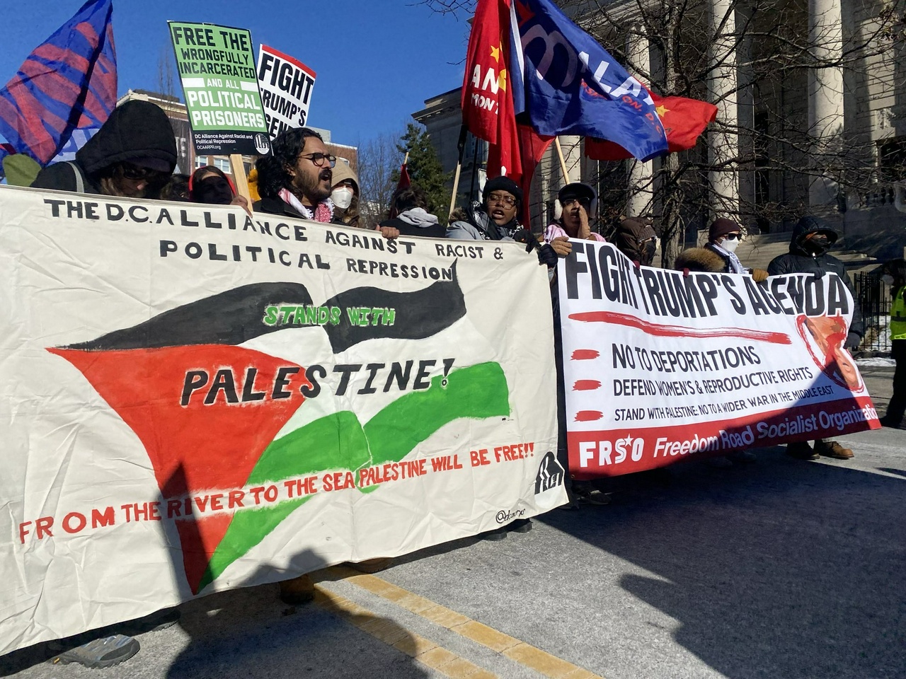 Protesters march against Trump agenda in Washington, DC.