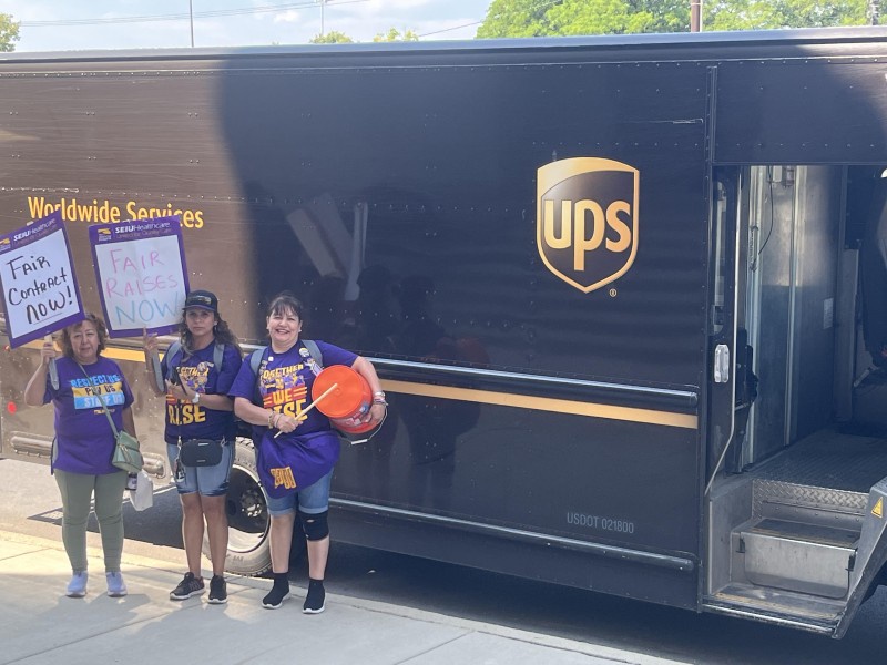 Loretto workers stop a UPS delivery truck. They have stopped multiple deliveries