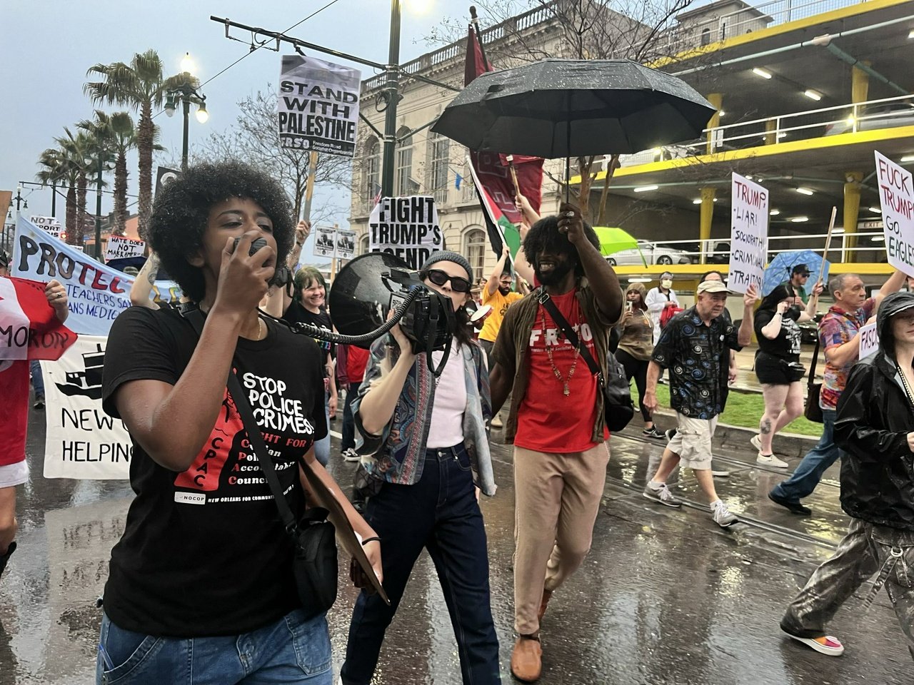 Protest at Super Bowl against Trump's reactionary agenda.