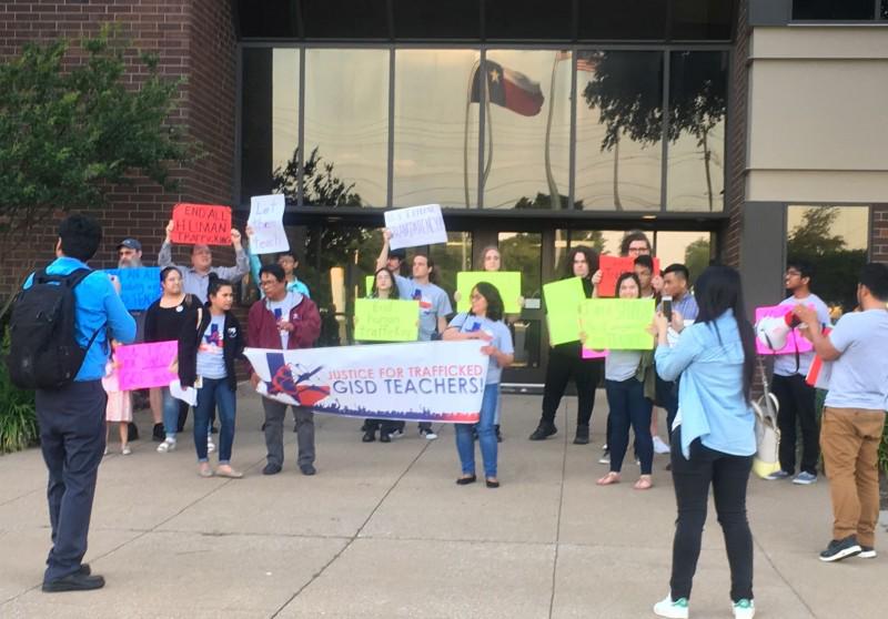 Trafficked teachers and their supporters gather outside the Garland ISD