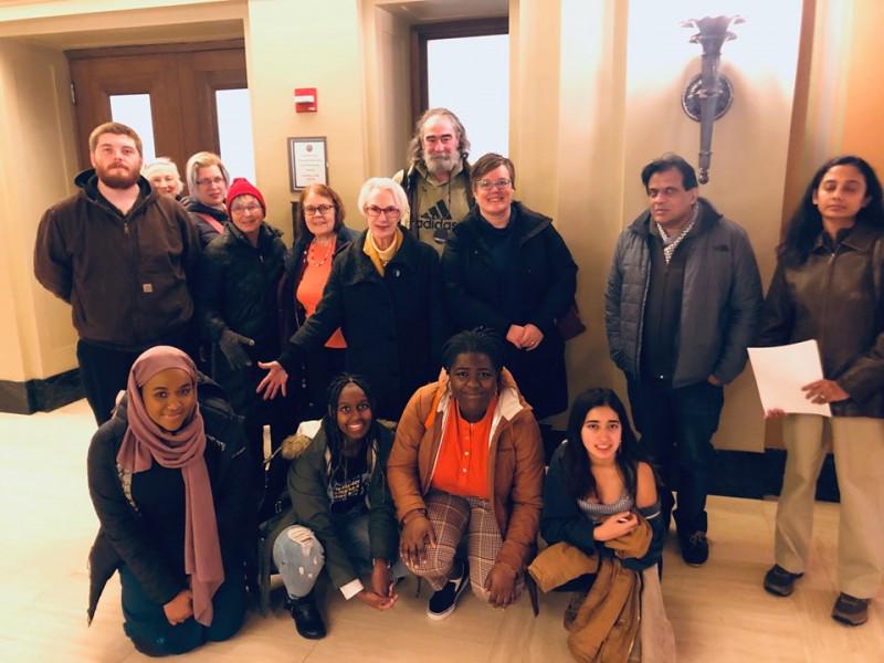 Activists at MN State Board of Investment (SBI) meeting at State Capitol