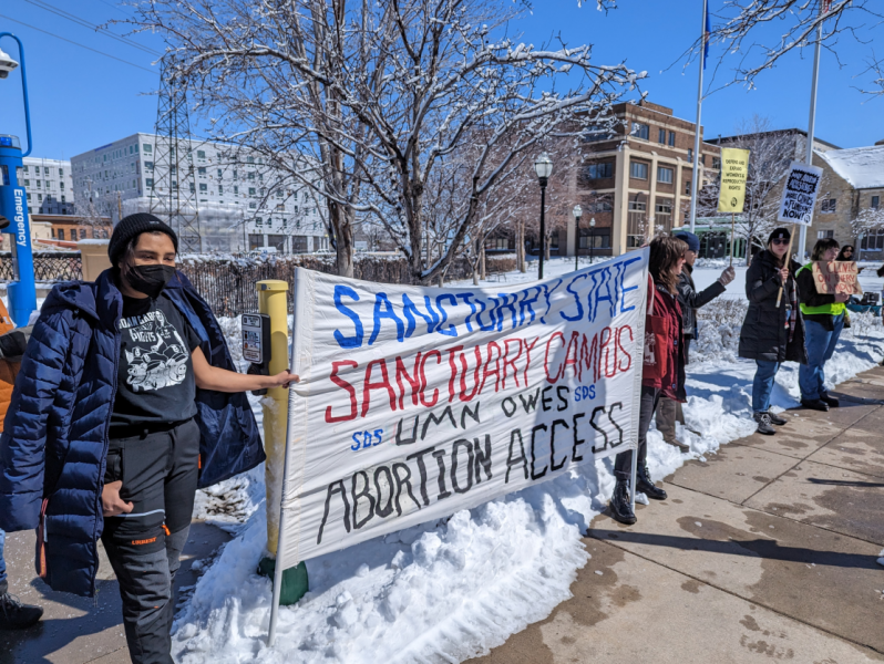 Twin Cities SDS rally for abortion access.