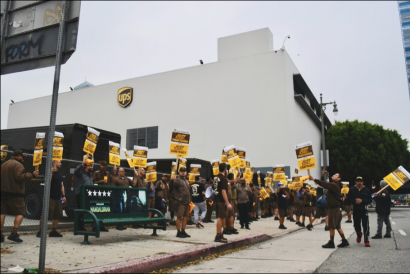 Teamsters reach a tentative agreement with UPS for a new contract following rall