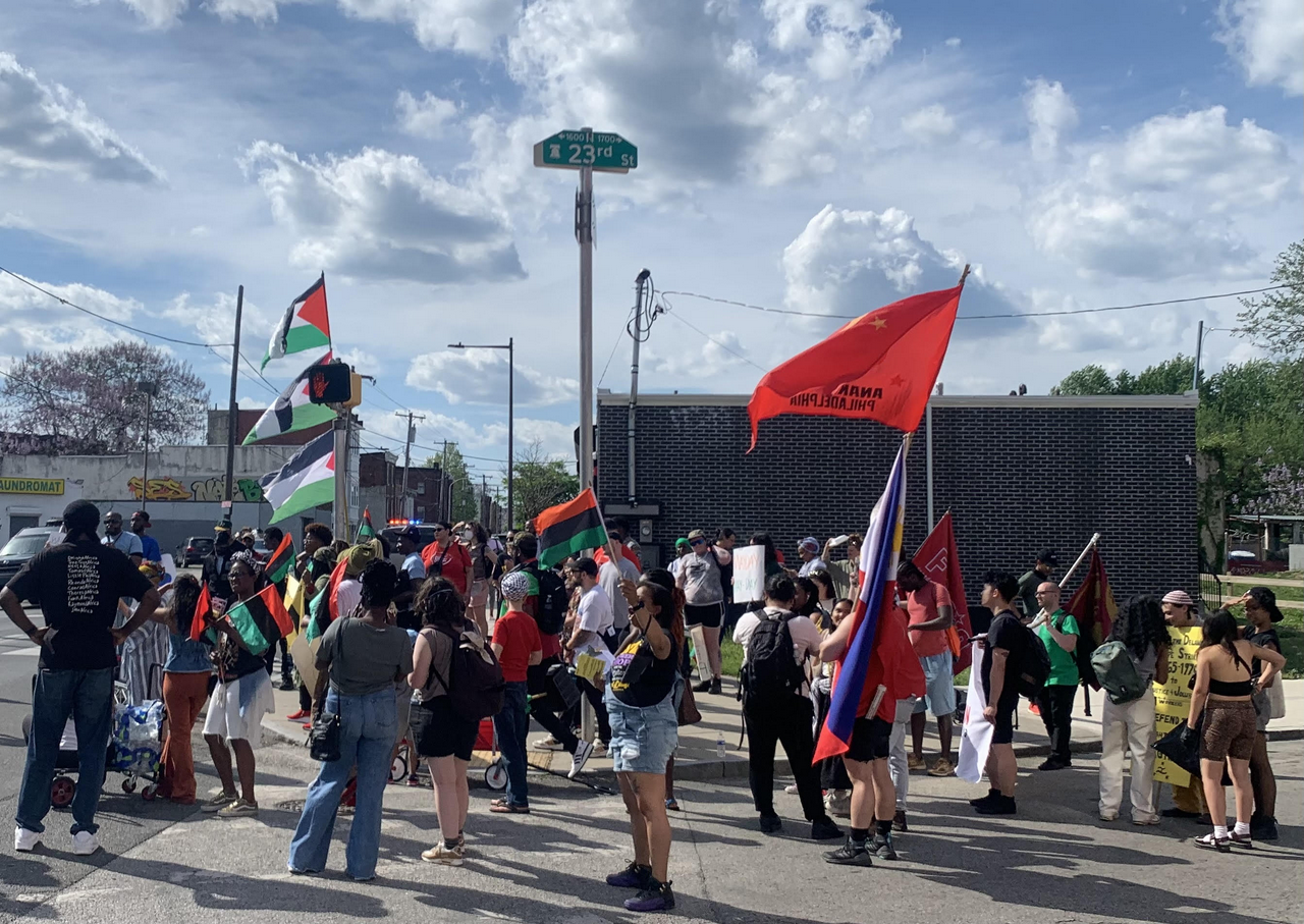 Marchers stop to listen to speakers on May Day in North Philadelphia   | Fight Back! News/staff