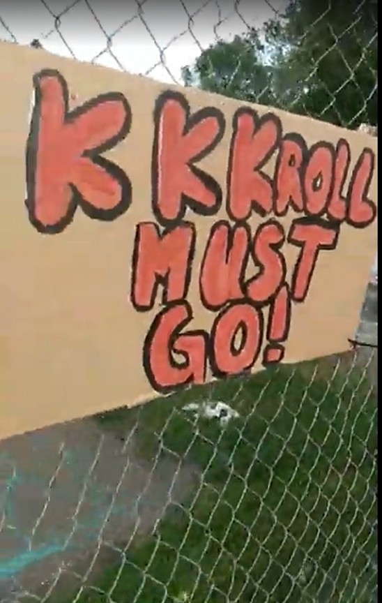 A picture of graffiti reading "KKKroll must Go!"