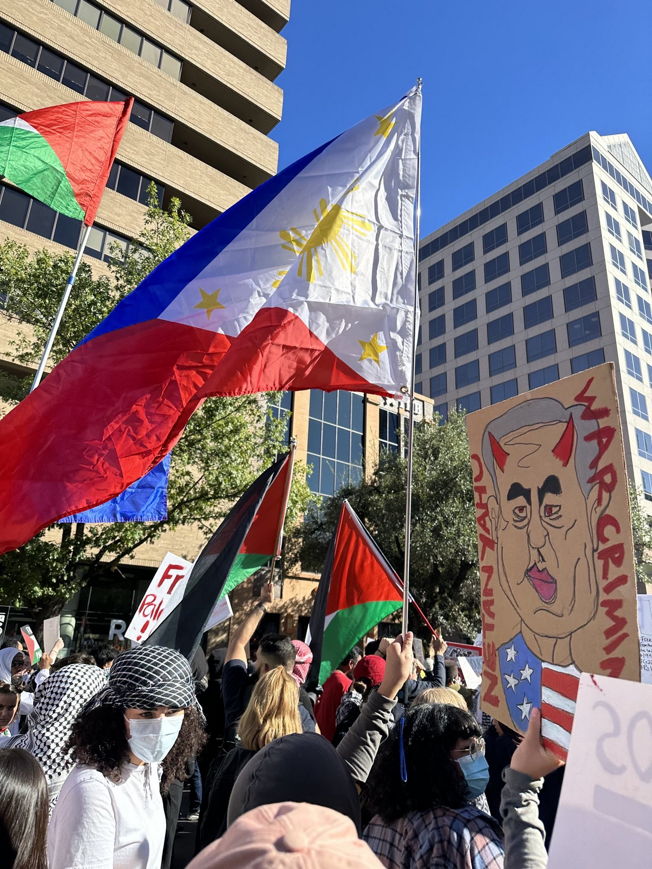 The Philippines flag waves united with Palestine flags in Dallas, Texas. | Fight Back! News/staff